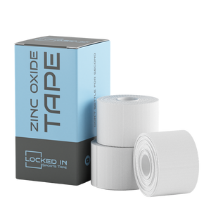 White zinc oxide sports tape rolls in light blue gray Football Matchday Kit box