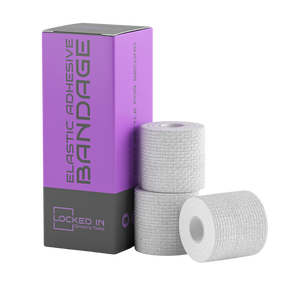 White EAB Tape rolls in Locked In Sports Tape purple gray box