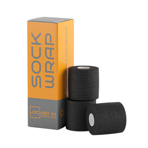 Black textured athletic tape rolls in Locked In Sports Tape box for Rugby Contact Support Pack
